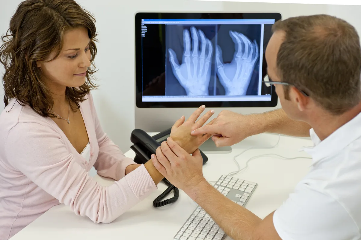 A hand surgeon performing a carpal tunnel release
