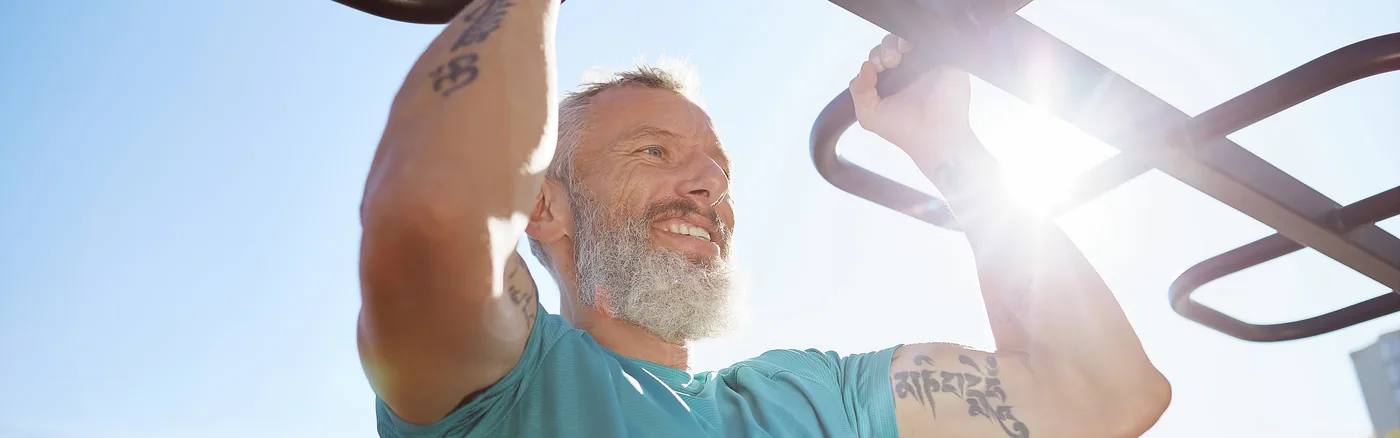 A patient lifting comfortably again after private hernia repair surgery