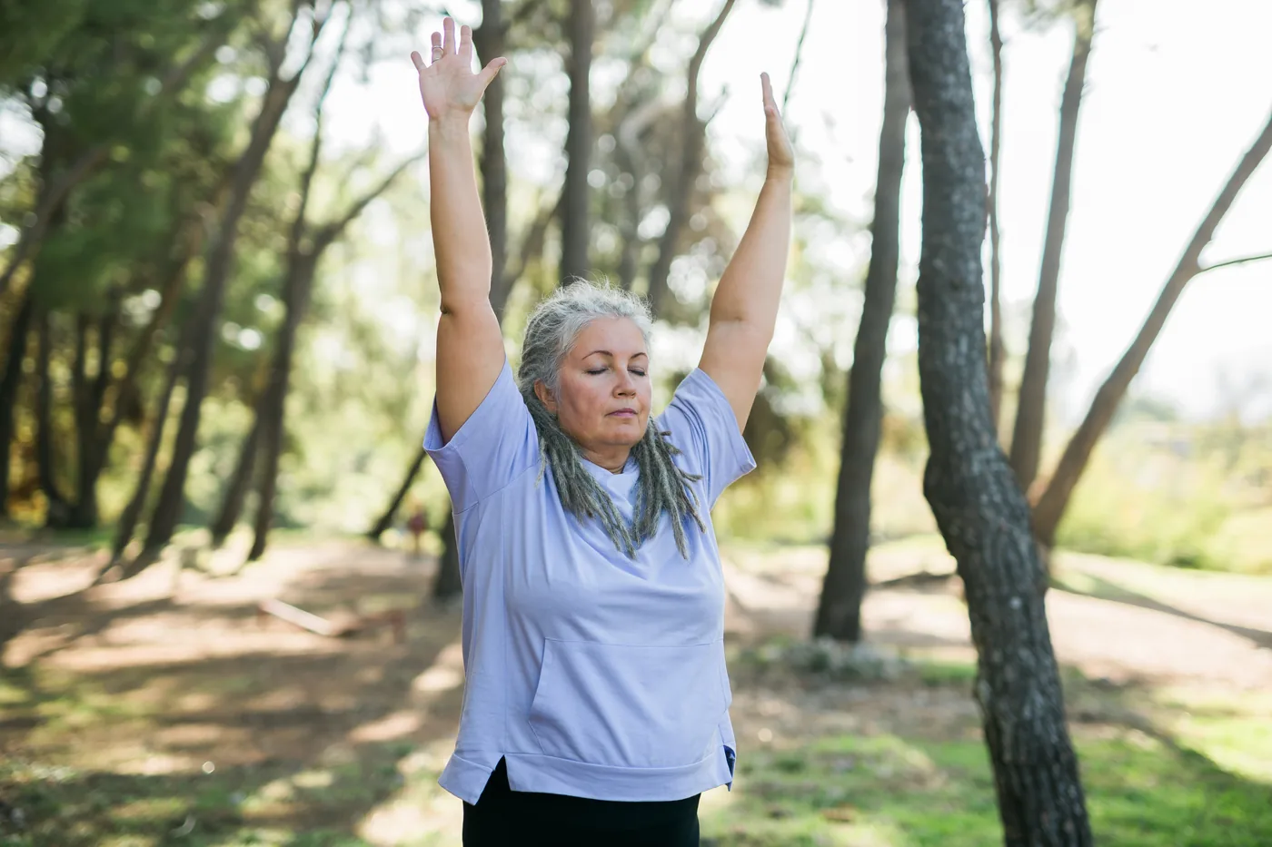 A patient reaching overhead without pain after private rotator cuff repair surgery
